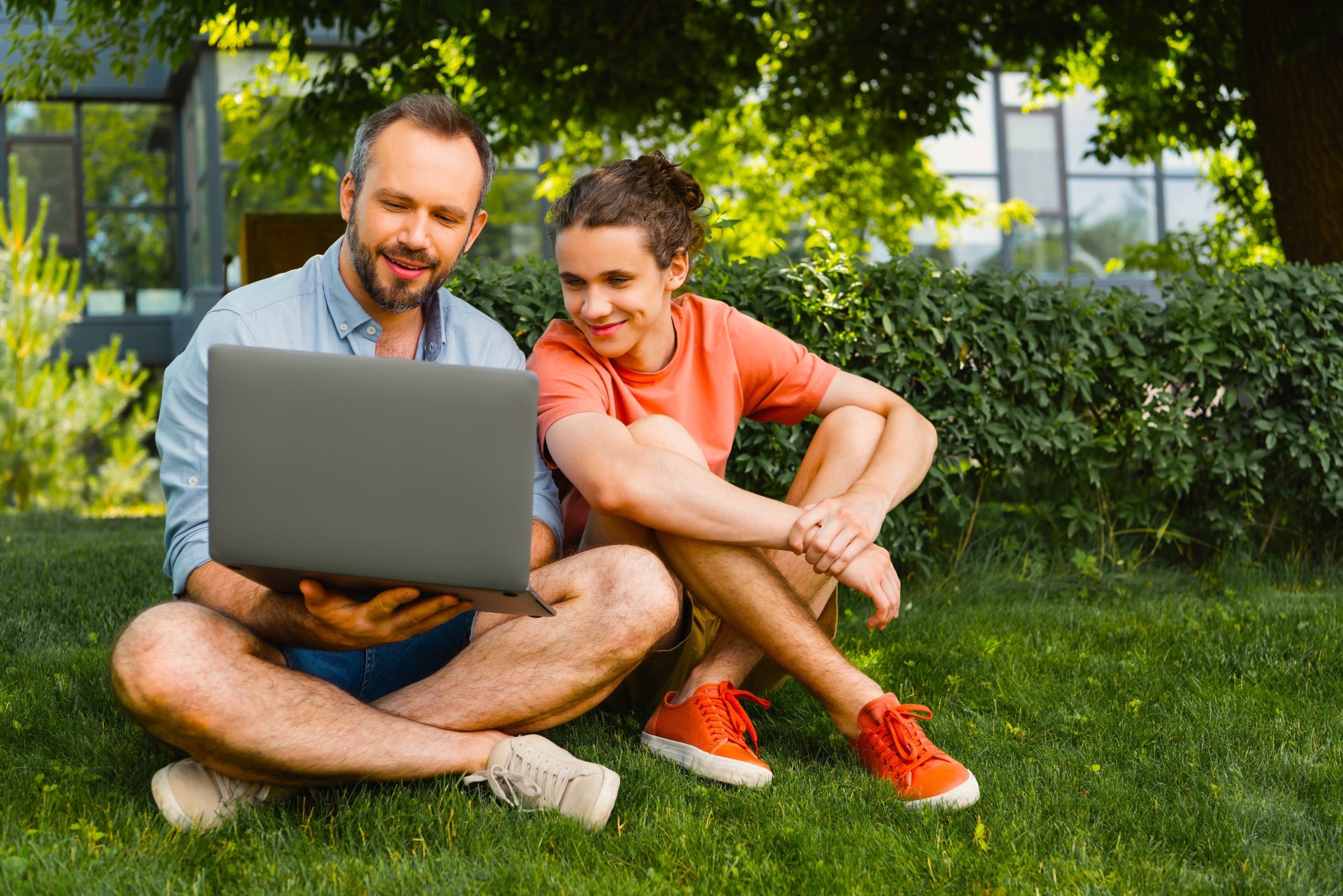 Tool Kit header image - father and son looking at laptop